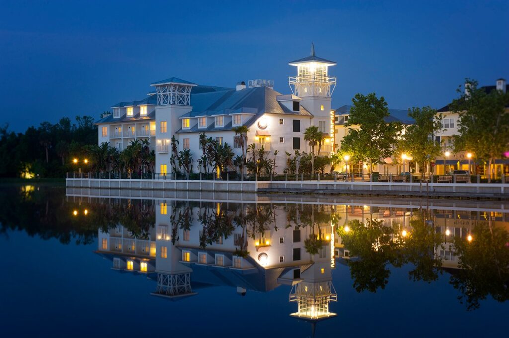 bohemian hotel celebration florida at night with reflection showing in the lake
